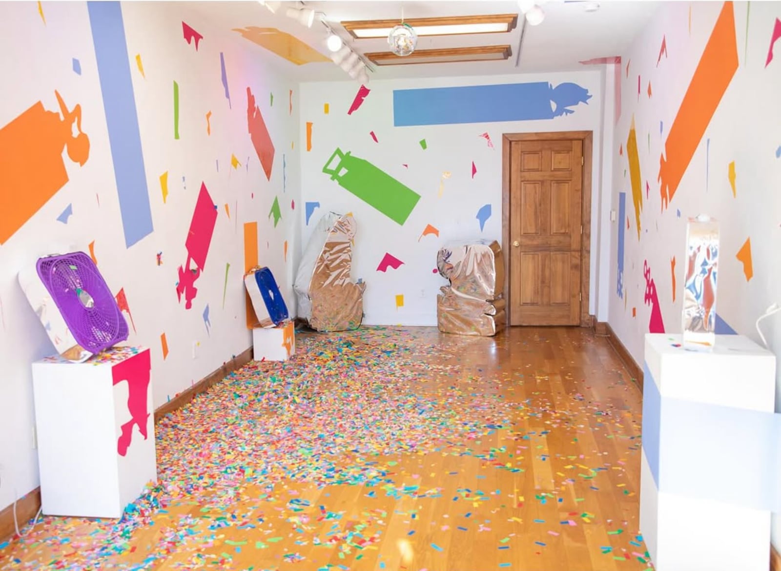 "Confetti Party" at Pique Gallery in Covington invited visitors to throw confetti and create confetti collages. CONTRIBUTED