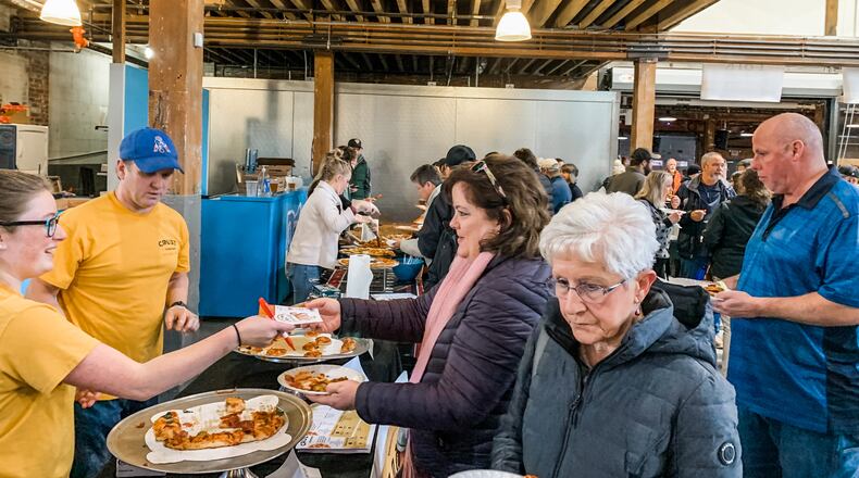 The third Slice of Springfield event gathered eight non-franchise Springfield pizza restaurants at Mother Stewart's Brewing Company, where visitors tasted samples from each and listened to live music. The event was a fundraiser for National Trail Parks and Recreation and Partners for the Parks. Contributed photo