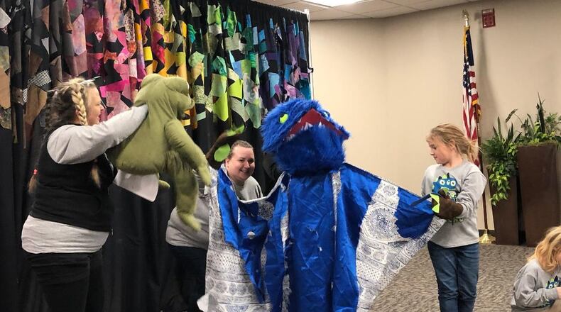Families created their own monsters who talked about their feelings during man-on-the-street interviews Friday during the finale of Project Jericho’s Winter Family Arts Camp at Clark State’s Brinkman Educational Center. Photo by Brett Turner