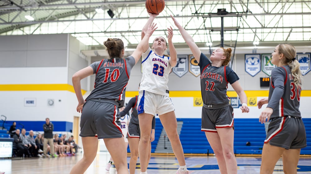 Carroll beat Goshen and Bellbrook beat Monroe to win Division III district titles on Saturday, Feb. 28, 2026 at Springfield High School. MICHAEL COOPER / STAFF