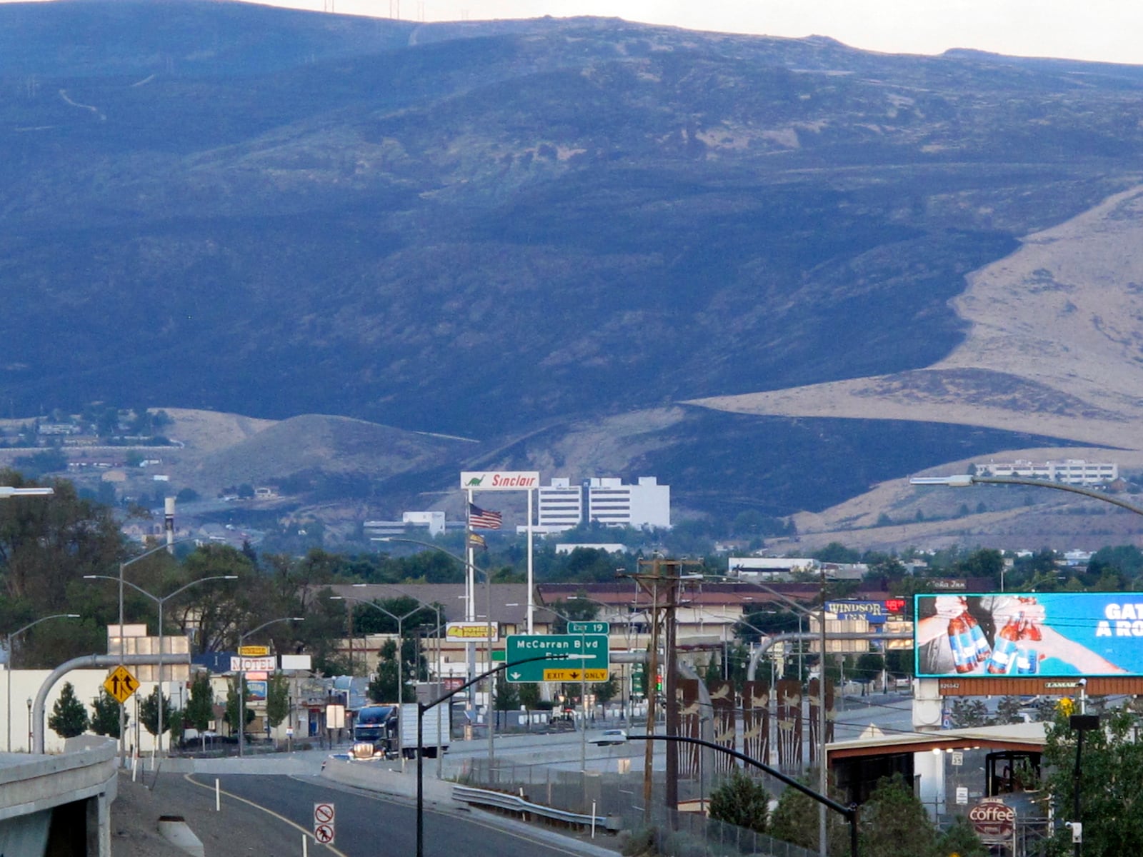 FILE - A view of on U.S. Interstate 80 in Sparks, Nev., Aug. 6, 2017. (AP Photo/Scott Sonner, File)