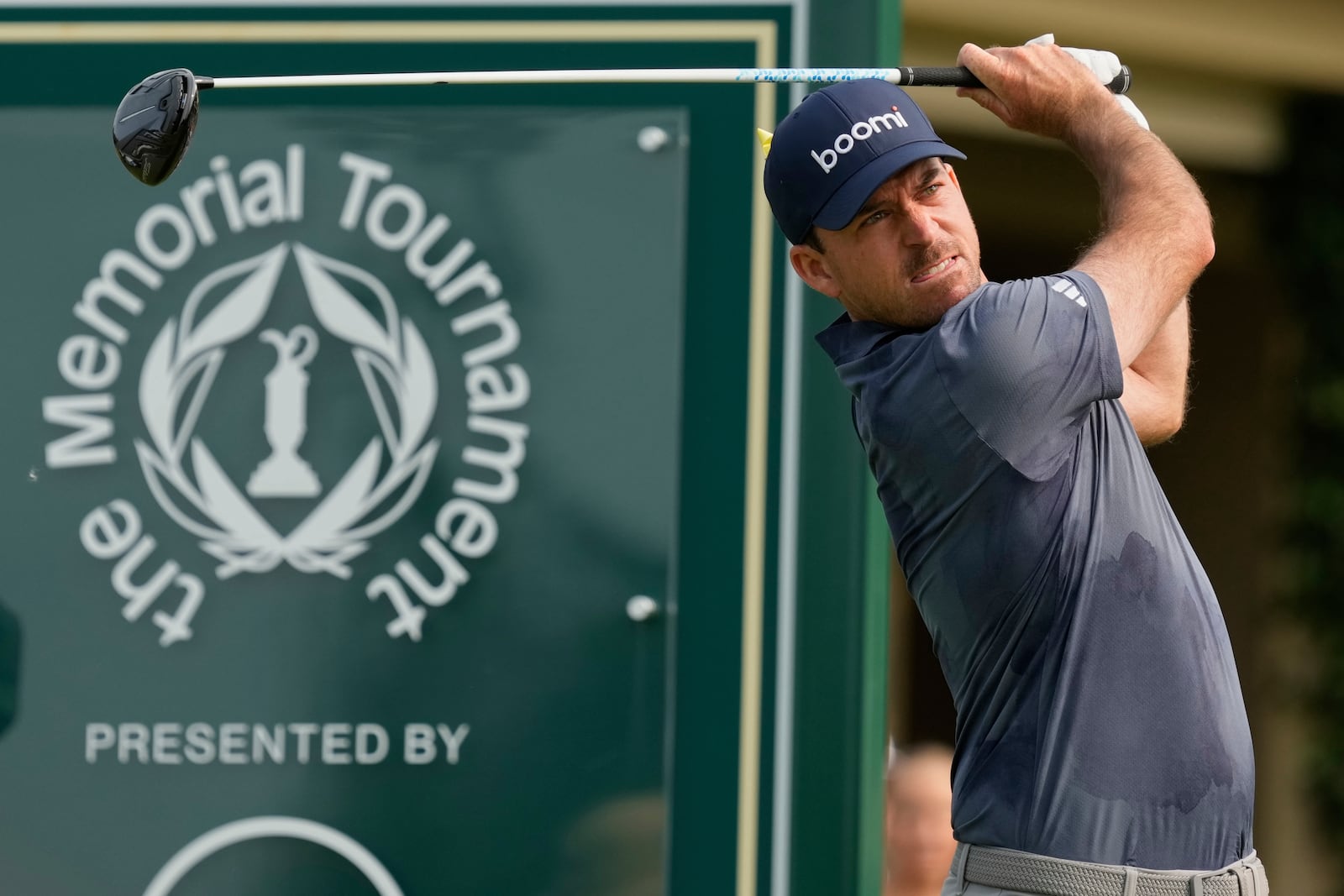 Nick Taylor hits from the 10th tee during the third round of the Memorial golf tournament Saturday, May 31, 2025, in Dublin, Ohio. (AP Photo/Sue Ogrocki)