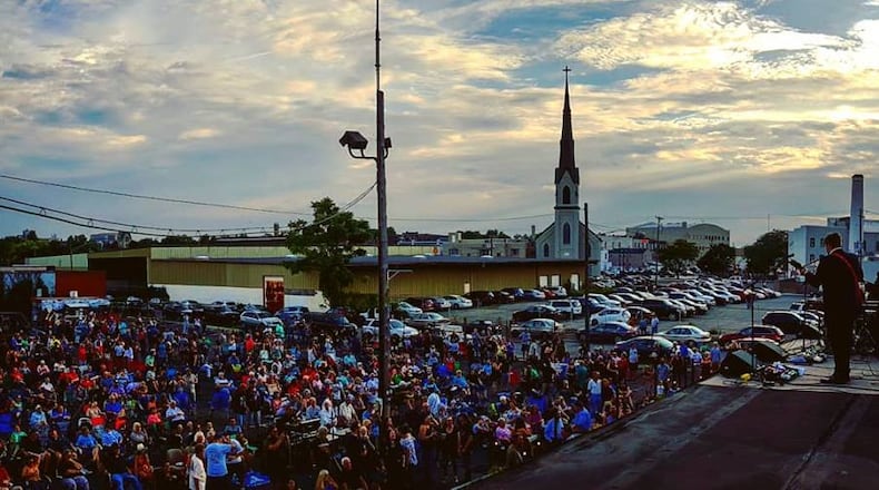 Beatles tribute group Come Together will play live from the 99 Parking Garage on Friday and the community can watch from National Road Commons Park for free.