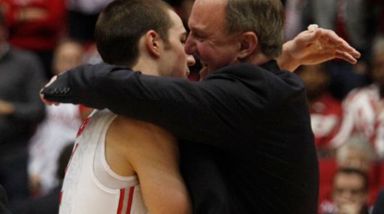 Ohio State coach Thad Matta hugs guard Aaron Craft after his game-winning 3-pointer. Ohio State beat Iowa State 78-75 on Sunday, March 24, 2013, in the third round of the NCAA tournament at UD Arena.