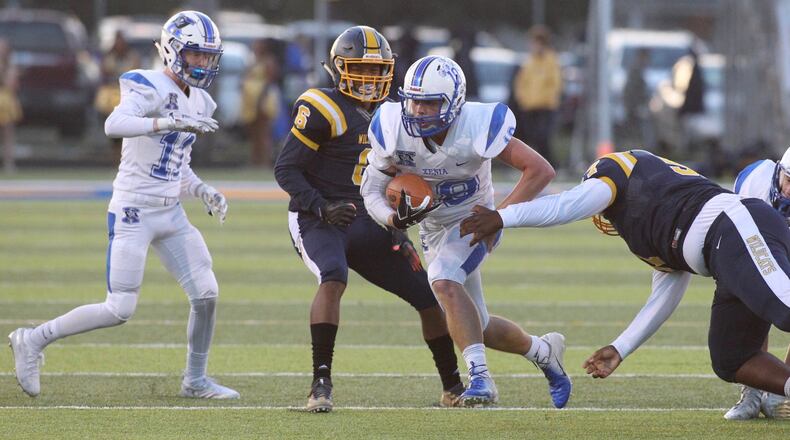 Xenia’s Nick Willis runs against Springfield on Friday, Sept. 28, 2018, at Evans Stadium in Springfield. David Jablonski/Staff