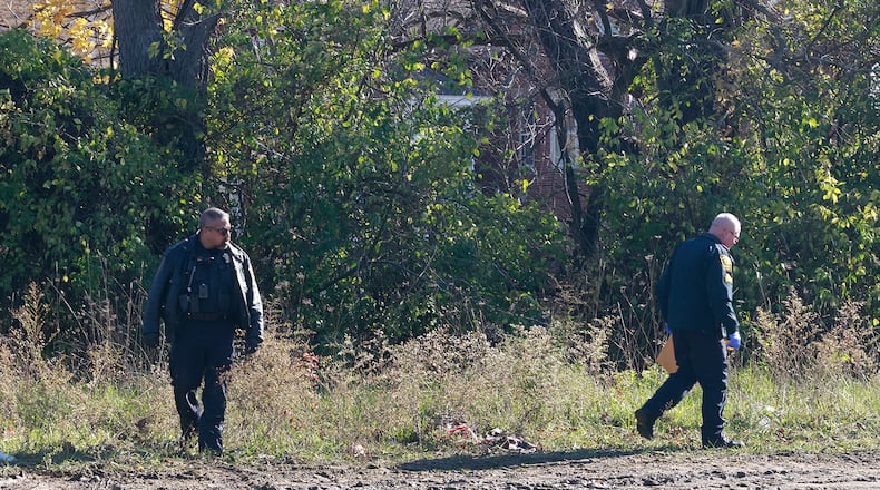 FILE - Springfield police pictured investigating in an alley between Southern Avenue and Johnny Lytle, a location that was possibly is connected to a shooting in the one hundred block of West Southern Avenue Tuesday, Nov. 26, 2024. BILL LACKEY/STAFF