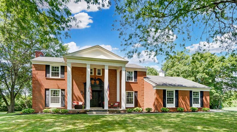 The brick, Colonial-style home has been remodeled and offers about 3,010 sq. ft. of living space with 4 bedrooms and a possible fifth in a first-floor study. The 2-story is set on 1.75 acres and has an attached, side-entry garage. CONTRIBUTED PHOTO