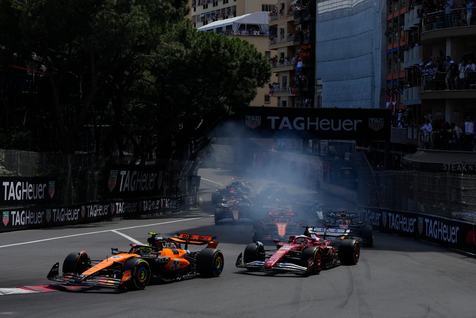 McLaren driver Lando Norris of Britain leads the field after the start during the Formula One Monaco Grand Prix race at the Monaco racetrack in Monaco, Sunday, May 25, 2025. (AP Photo/Manu Fernandez)