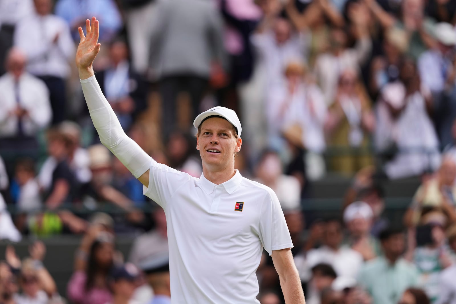 Jannik Sinner of Italy celebrates winning the men's singles quarter final match against Ben Shelton of the U.S. at the Wimbledon Tennis Championships in London, Wednesday, July 9, 2025.(AP Photo/Kirsty Wigglesworth)