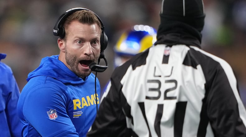 Los Angeles Rams head coach Sean McVay reacts as offensive lineman Kevin Dotson lies on the field after a play during the first half of an NFL football game against the Seattle Seahawks, Thursday, Dec. 18, 2025, in Seattle. (AP Photo/Lindsey Wasson)
