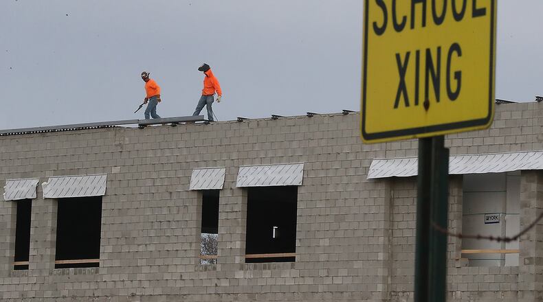 Work continues on the new Greenon School Thursday. BILL LACKEY/STAFF