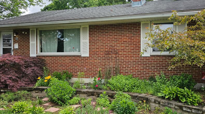 Angela Clay's home in West Carrollton was purchased as her starter home but she has been improving it and making it a forever home instead. CONTRIBUTED