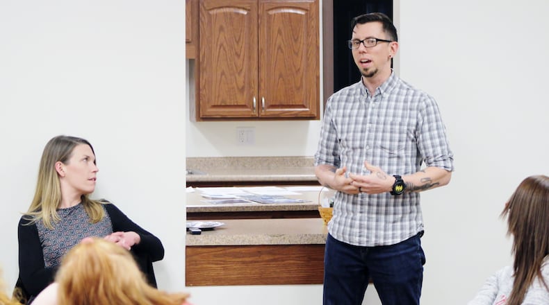 Jesse Heffernan, the National Outreach & Empowerment Coordinator for Faces and Voices of Recovery speaks at the Families of Addicts meeting in Springfield on Tuesday, Jan. 23. MICHAEL COOPER/STAFF
