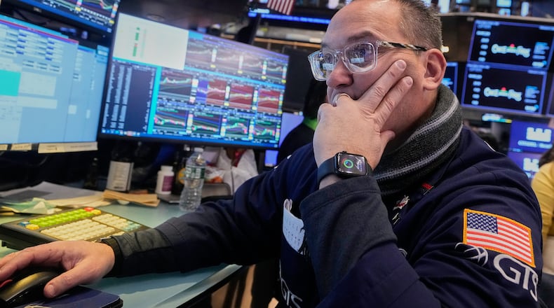 Specialist Anthony Matesic works at his post on the floor of the New York Stock Exchange, Friday, Feb. 6, 2026. (AP Photo/Richard Drew)
