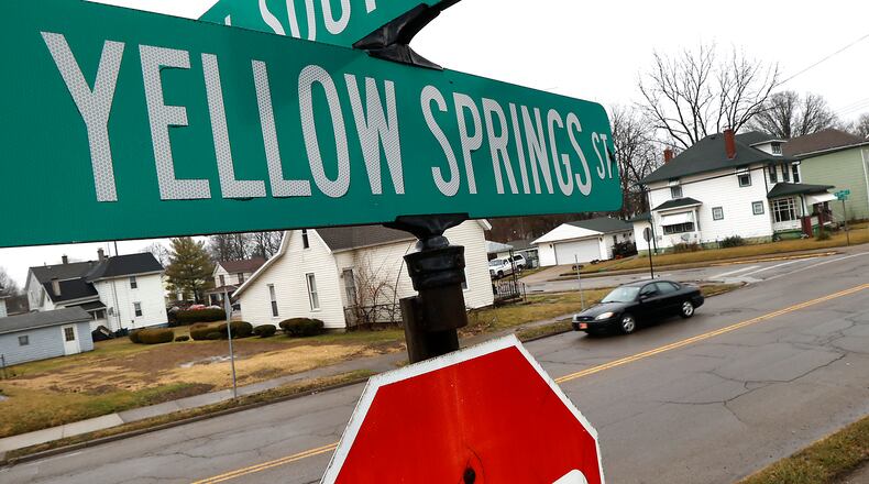 A car drives along Yellow Springs Street in Springfield Thursday, Feb. 16, 2023. Springfield City Commission this week authorized major spending for the streets program started in 2018 by approving a $3.5 million project involving the reconstruction of Yellow Springs Street. BILL LACKEY/STAFF