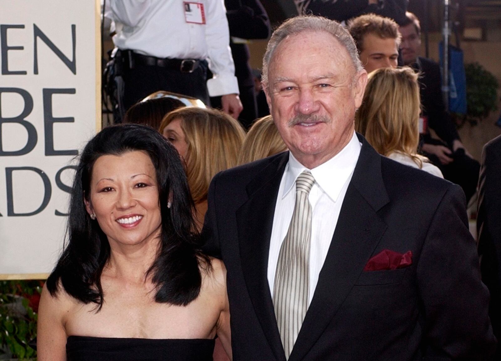 FILE - Actor Gene Hackman arrives with his wife, Betsy Arakawa, for the 60th Annual Golden Globe Awards in Beverly Hills, Calif., Jan. 19, 2003. (AP Photo/Mark J. Terrill, File)