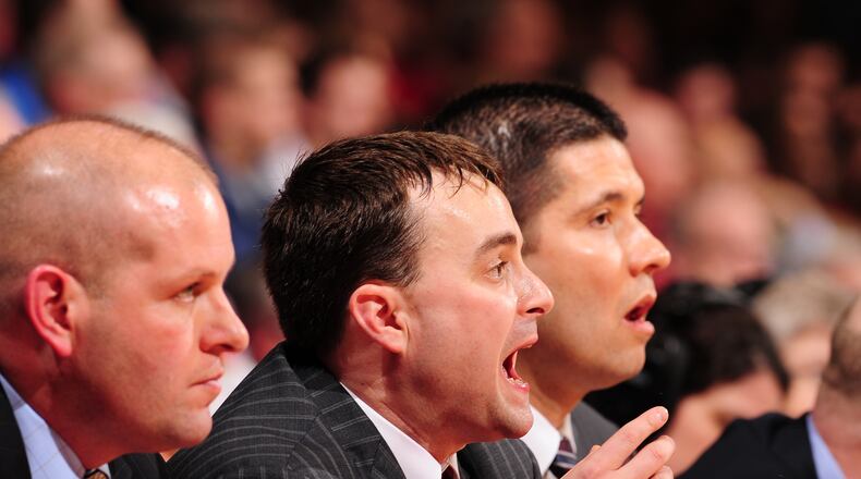 Dayton's Archie Miller calls out a play against duquesne. The Flyers fell 83-73 at UD Arena PHOTO ERIK SCHELKUN