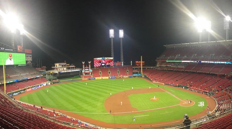 The scene at Great American Ball Park in the ninth inning as the Reds play the Braves on Monday, April 23, 2018, in Cincinnati. David Jablonski/Staff