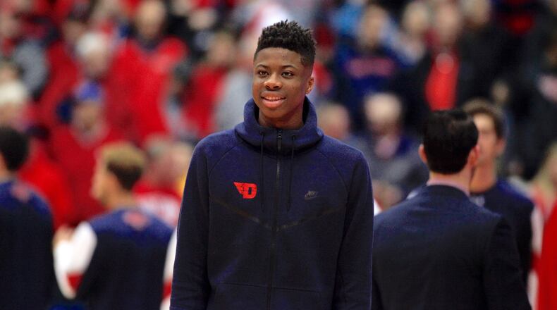 Kostas Antetokounmpo watches Dayton warm up before a game against Saint Mary’s at UD Arena in November. David Jablonski/Staff