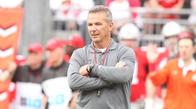 Ohio State’s Urban Meyer watches the spring game on Saturday, April 14, 2018, at Ohio Stadium in Columbus. David Jablonski/Staff