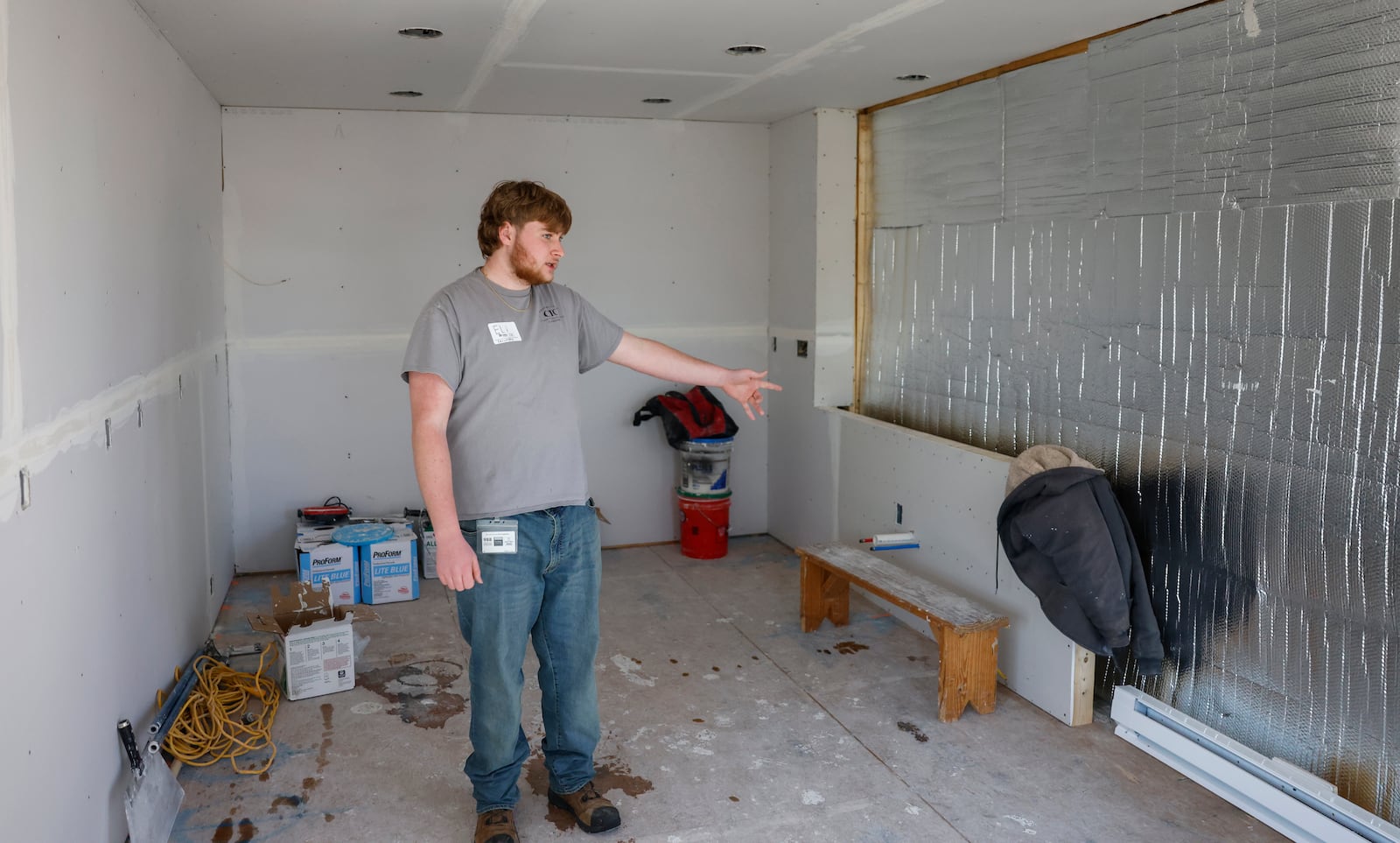 Eli Koster, a student at Springfield-Clark Career Technology Career, leads a tour on Thursday, Feb. 26, 2026, of a modular home built at Springfield-Clark CTC as part of a partnership with the Habitat for Humanity of Greater Dayton and Springfield-Clark CTC. JOSEPH COOKE/STAFF