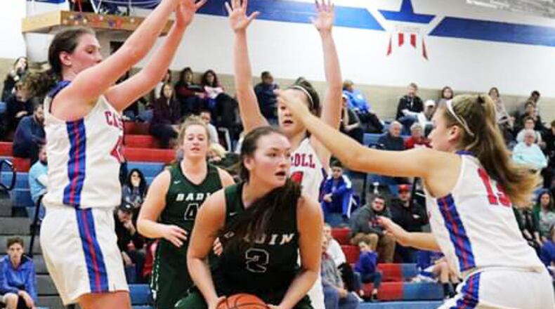 Badin’s Shelby Nusbaum (2) is surrounded by Carroll’s Julia Keller (42) and Jillian Roberts (13) during the Patriots’ 64-57 win. Carroll is No. 1 in Division II in the debut of the girls basketball state polls and Badin No. 9 in D-II. CONTRIBUTED PHOTO BY TERRI ADAMS