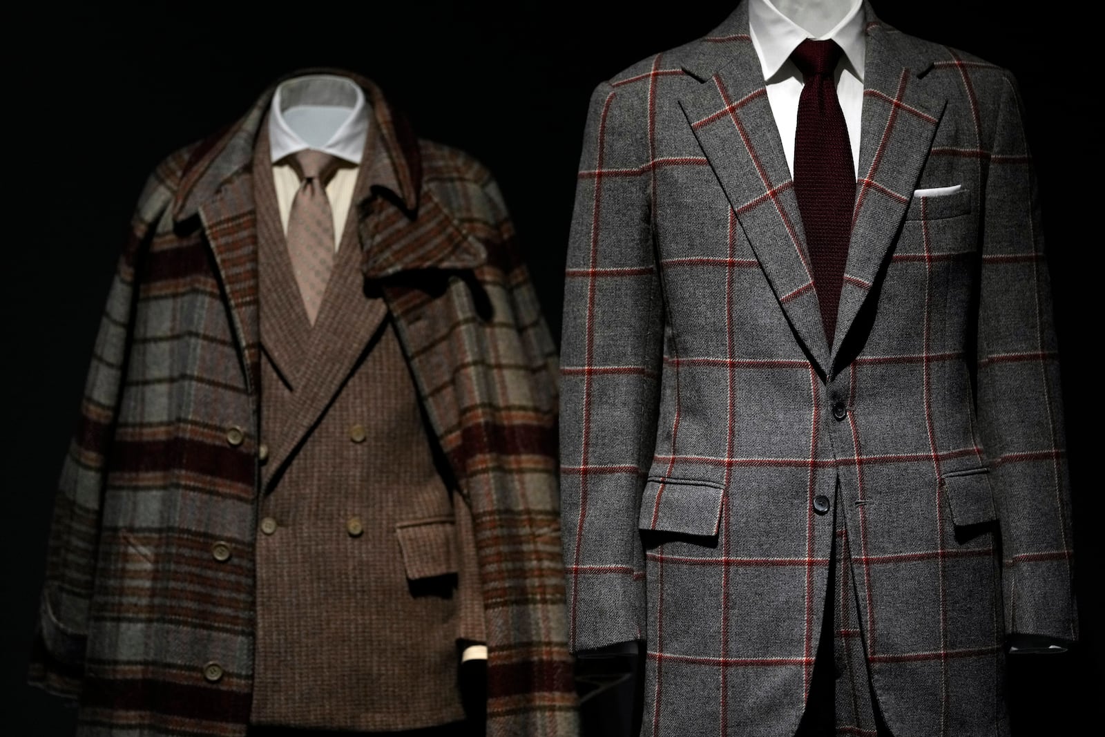 Designs by Jeffrey Banks, left, and Morty Sills are displayed at the Metropolitan Museum of Art's Costume Institute exhibition, "Superfine: Tailoring Black Style," on Saturday, May 3, 2025, in New York. (Photo by Charles Sykes/Invision/AP)