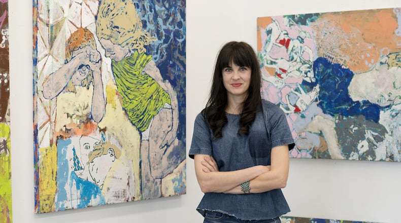 Oakwood artist Mychaelyn Michalec with her works: L-R: “Erasing and being erased" in 2016, Acrylic on canvas, 40”. x 40”; “Maarten and his dream of horses,” 30” x 40”, acrylic on canvas. Michalec was one of 75 artists in Ohio to win an award and $4,000 in funding from the Ohio Arts Council. CONTRIBUTED IMAGE BY MARK REAMY