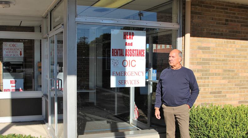 Michael Calabrese, with the OIC of Clark County, stands in front of a building on 920 W. Main St., in Springfield where people can pick up and drop off application forms for rental assistance. His organization has been allocated over $7.6 million in those funds since November. Hasan Karim/Staff