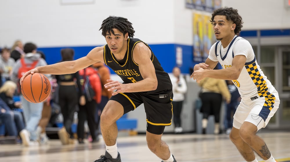 The Centerville High School boys basketball team beat Springfield 56-44 on Tuesday, Feb. 3, 2026 to win their eighth straight Greater Western Ohio Conference championship. MICHAEL COOPER / STAFF