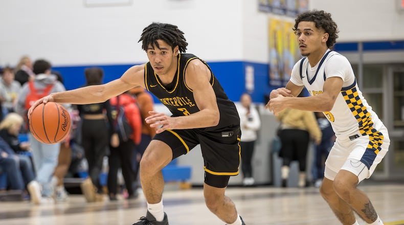 The Centerville High School boys basketball team beat Springfield 56-44 on Tuesday, Feb. 3, 2026 to win their eighth straight Greater Western Ohio Conference championship. MICHAEL COOPER / STAFF