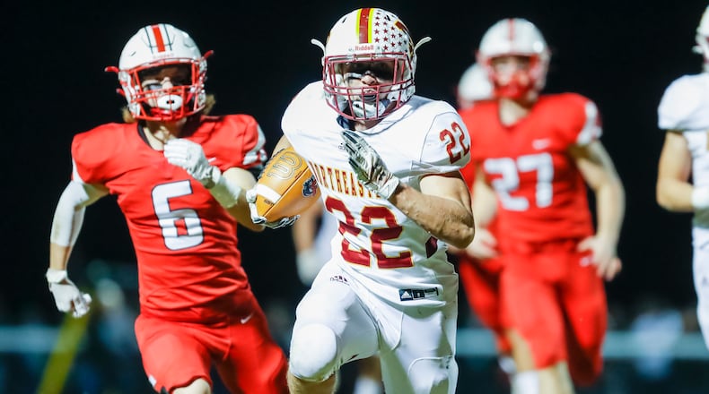 Northeastern High School sophomore running back Garrett Chadwell carries the ball during their game against Fairbanks on Friday, Oct. 21, 2022 at Kyre Field in Milford Center. CONTRIBUTED PHOTO BY MICHAEL COOPER