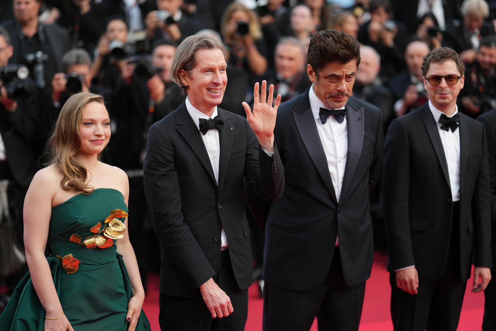 Mia Threapleton, from left, director Wes Anderson, Benicio del Toro and Michael Cera pose for photographers upon arrival at the premiere of the film 'The Phoenician Scheme' at the 78th international film festival, Cannes, southern France, Sunday, May 18, 2025. (Photo by Lewis Joly/Invision/AP)