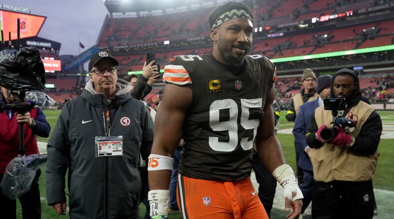 Cleveland Browns defensive end Myles Garrett walks off the field after an NFL football game against the Pittsburgh Steelers, Sunday, Dec. 28, 2025, in Cleveland. (AP Photo/Sue Ogrocki)