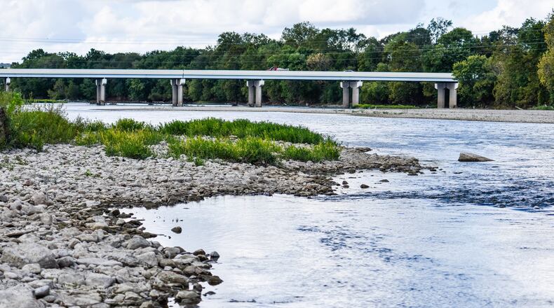 Dry weather the past few weeks has the Great Miami River at a lower level than it has been in a while. Some areas normally covered in water are exposed. This is a view near the Germantown Road bridge in Middletown. NICK GRAHAM/STAFF