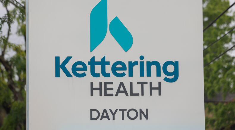 The sign of the Kettering Health Dayton near the main entrance on Thursday, May 22, 2025. JOSEPH COOKE/STAFF
