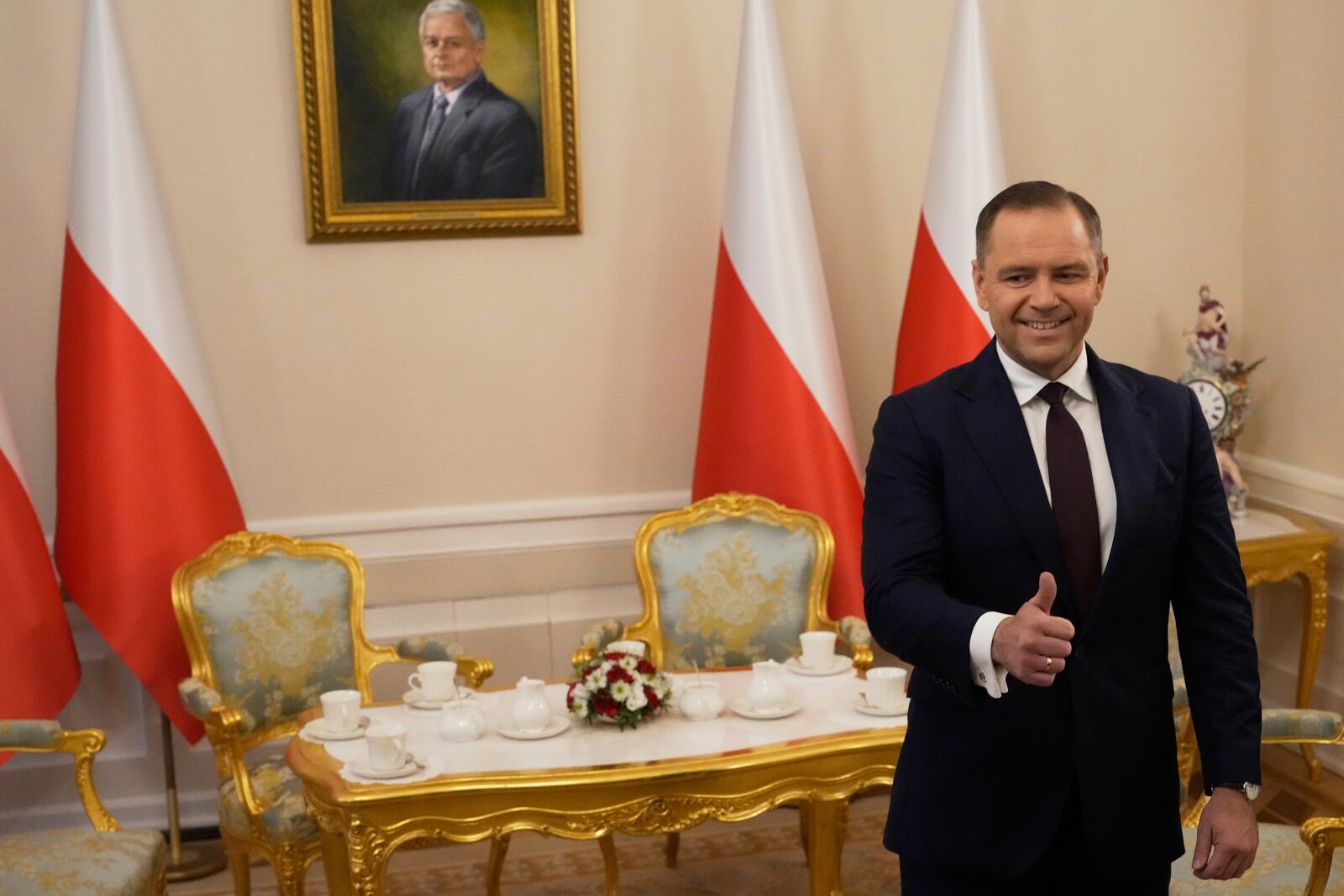 Poland's President Elect Karol Nawrocki gestures at the Presidential Palace in Warsaw, Poland, Tuesday, June 3, 2025. (AP Photo/Czarek Sokolowski)