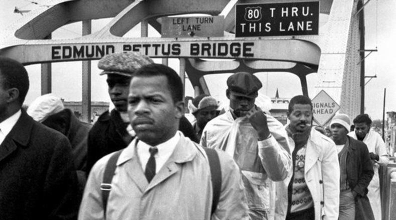 In 1965, Lewis attempted to lead a group of marchers over the Edmund Pettus Bridge in Selma. They were repelled by police officers in what would be known as Bloody Sunday.