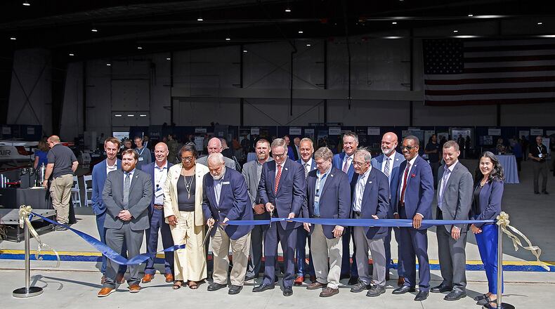 Springfield, state and national officials cut the ribbon for the new National Advanced Air Mobility Center of Excellence at Springfield-Beckley Airport Monday, Sept. 18, 2023. BILL LACKEY/STAFF