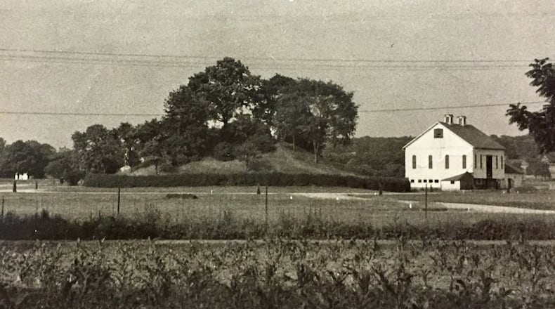 The second tallest mound in Ohio is in downtown Enon. Owned by the village, it is 40 feet tall. CONTRIBUTED