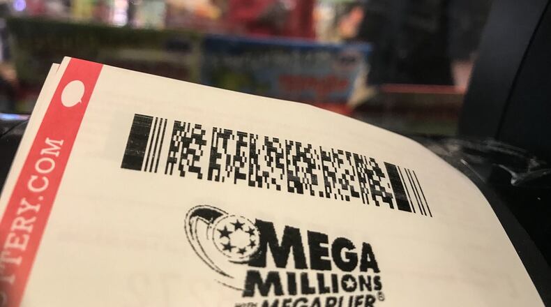 The Powerball jackpot is up to $363 million and the Mega Millions jackpot climbed to $401 million to close out 2020. JIM NOELKER/STAFF