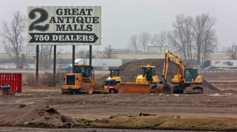 The future site of the new Sheetz at 4700 S. Charleston Pike is progressing. The Antique Center building has been demolished and machinery is prepping the site. BILL LACKEY/STAFF