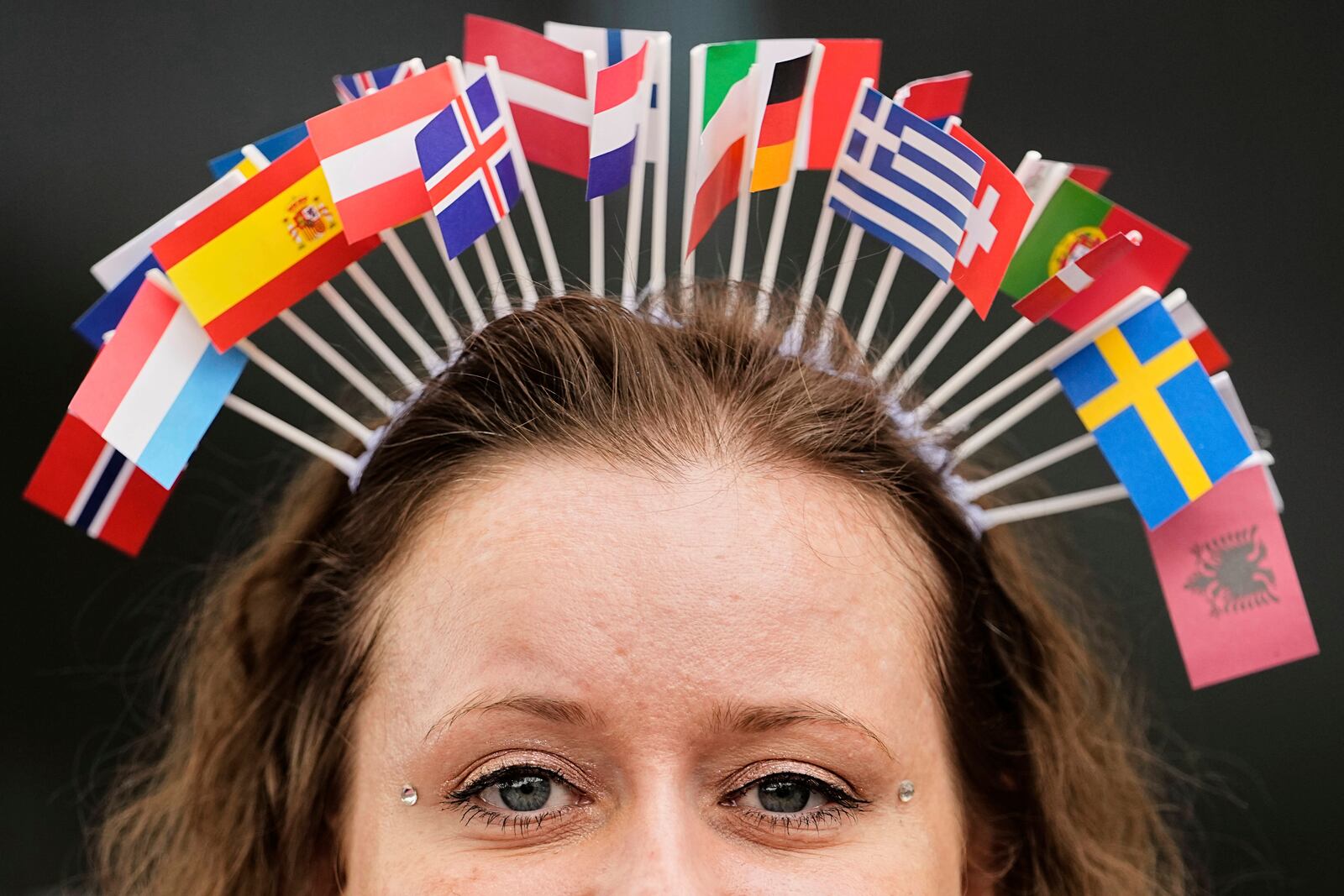 A Eurovision fan is pictured in the cue to the Grand Final of the 69th Eurovision Song Contest, in Basel, Switzerland, Saturday, May 17, 2025. (AP Photo/Martin Meissner)