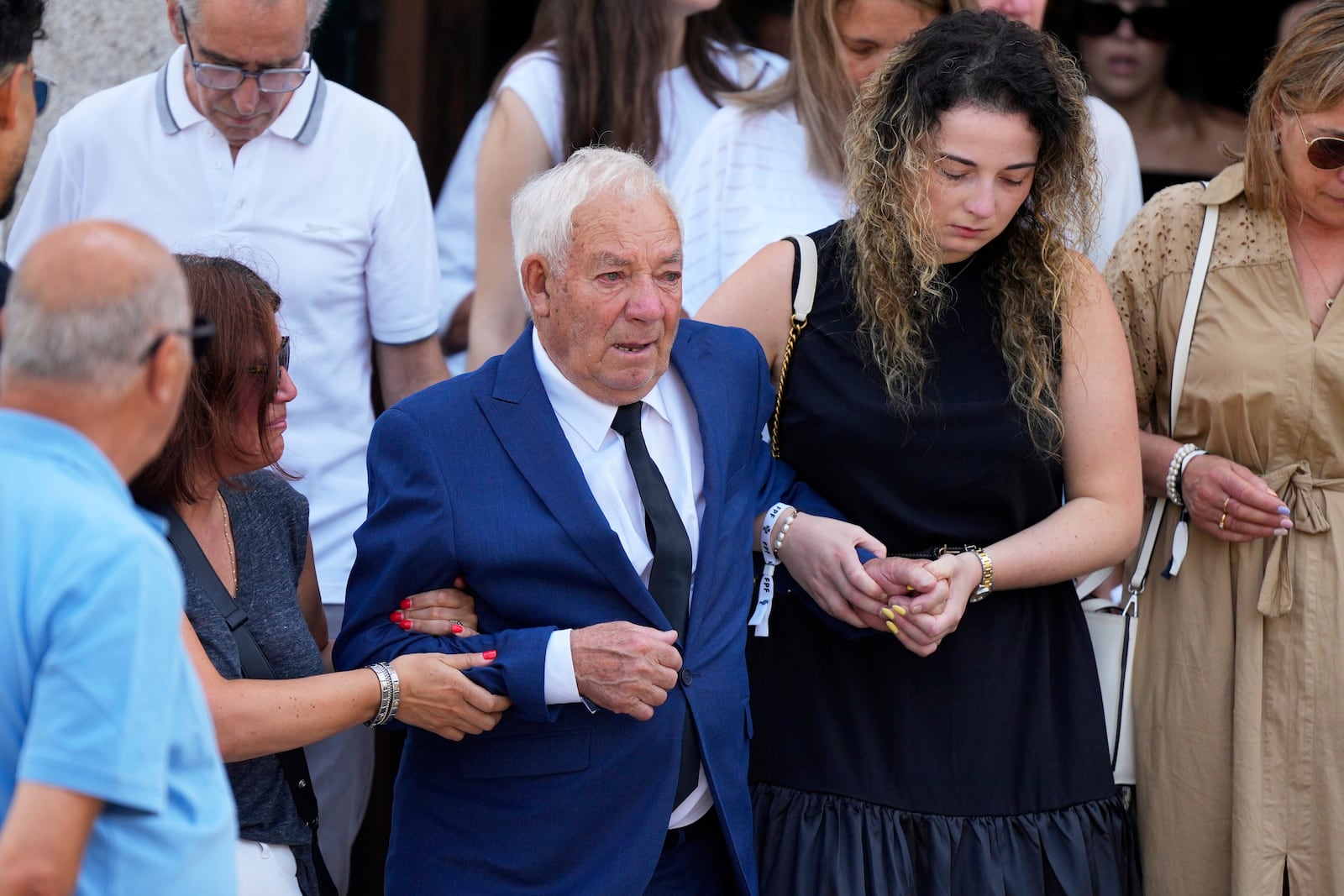 Joaquim Silva, grandfather of Diogo Jota and André Silva, follow their coffins during their funeral in Gondomar, near Porto, Portugal, on Saturday, July 5, 2025. (AP Photo/Manu Fernandez)