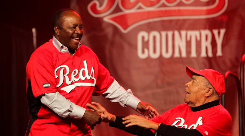 Chuck Harmon greets Joe Morgan as the former Reds are introduced during the opening day of RedsFest at the Duke Energy Convention Center in Cincinnati, Friday, Dec. 7, 2012. Staff photo by Greg Lynch