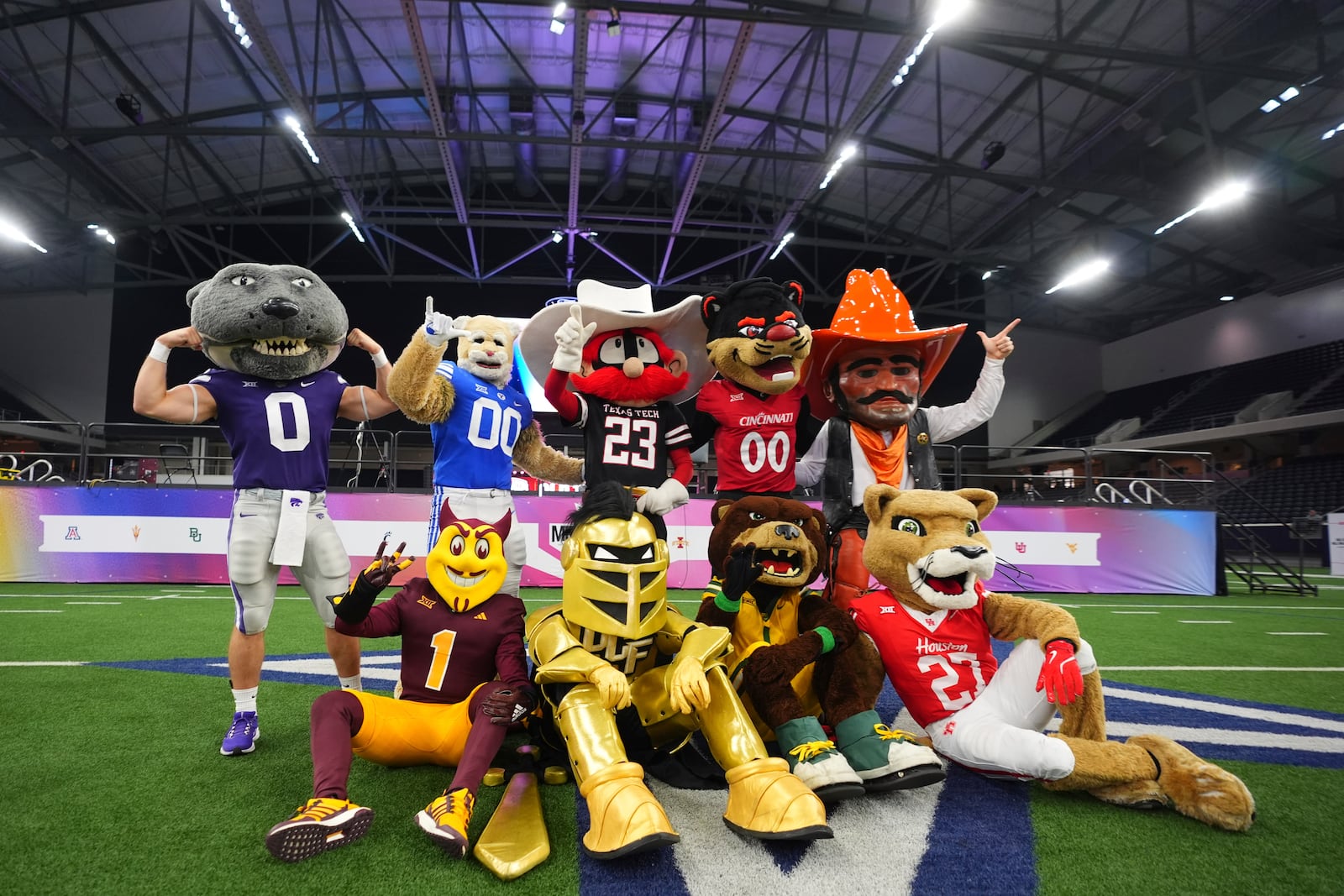 University mascots posse for photos before the start of day two of Big 12 NCAA college football media days in Frisco, Texas, Wednesday, July 9, 2025. (AP Photo/LM Otero)