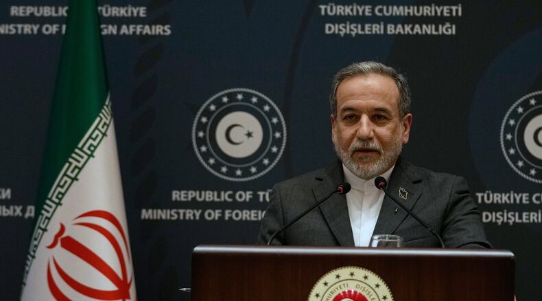 Iranian Foreign Minister Abbas Araghchi speaks to journalists during a joint press conference with his Turkish counterpart Hakan Fidan in Istanbul, Turkey, Friday, Jan. 30, 2026. (AP Photo/Khalil Hamra)