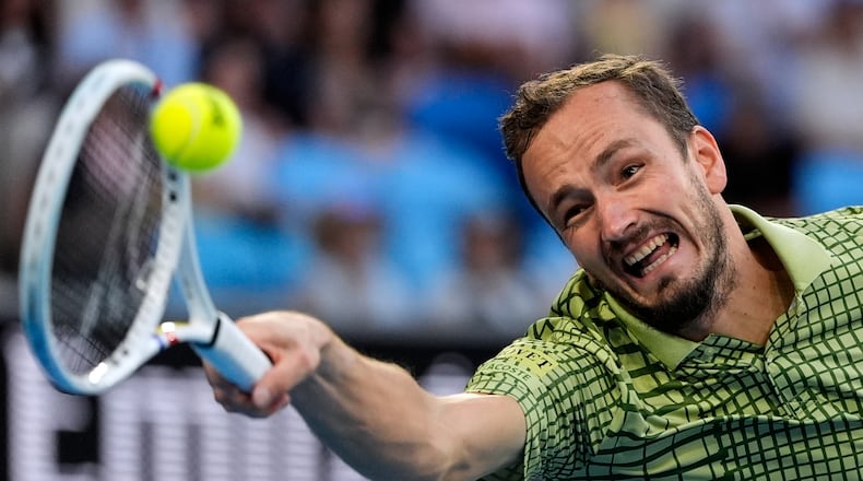 FILE - Daniil Medvedev of Russia plays a forehand return to Learner Tien of the U.S. during their fourth round match at the Australian Open tennis championship in Melbourne, Australia, Jan. 25, 2026. (AP Photo/Asanka Brendon Ratnayake, file)