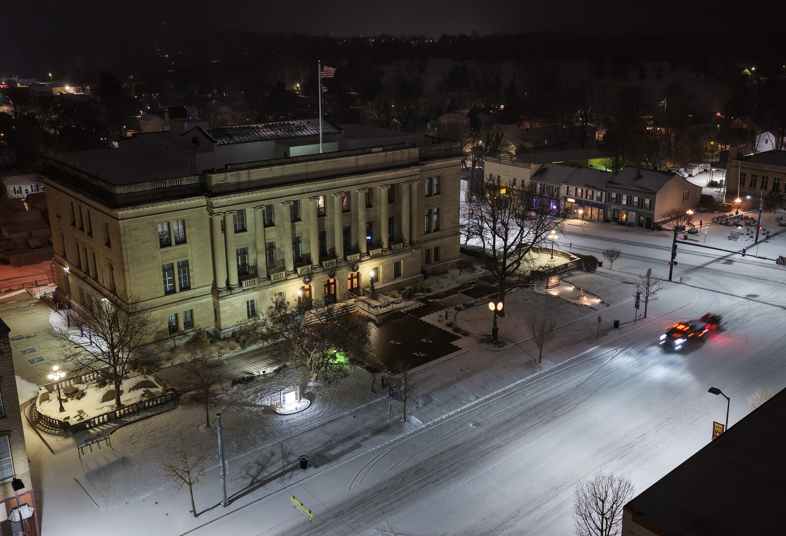 Snow falls Saturday night, Jan. 24, 2026 in Eaton in Preble County. By 10 a.m. Sunday, the region had experienced nearly 12 inches of snow, with more on the way. Visit Journal-News.com for the latest snow coverage. NICK GRAHAM/STAFF