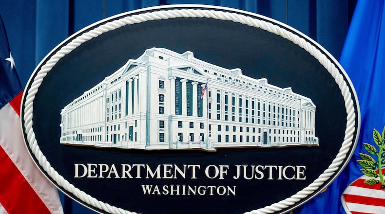 FILE - The Justice Department sign is shown in Washington, Nov. 18, 2022. (AP Photo/Andrew Harnik, File)